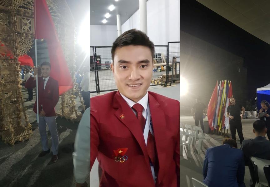 Kiếm thủ cầm cờ Việt Nam Vũ Thành An selfie ở Lễ Khai mạc SEA Games 30